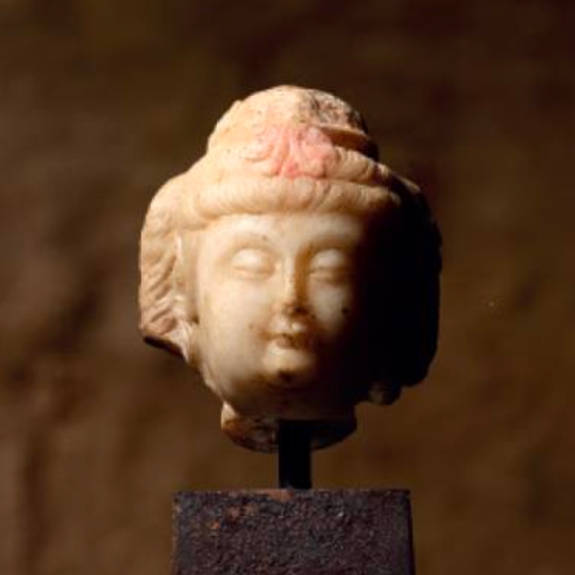 A white marble head of Guanyin