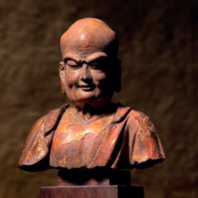 A gilt-lacquered wood bust of a luohan