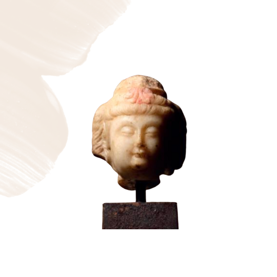 A white marble head of Guanyin